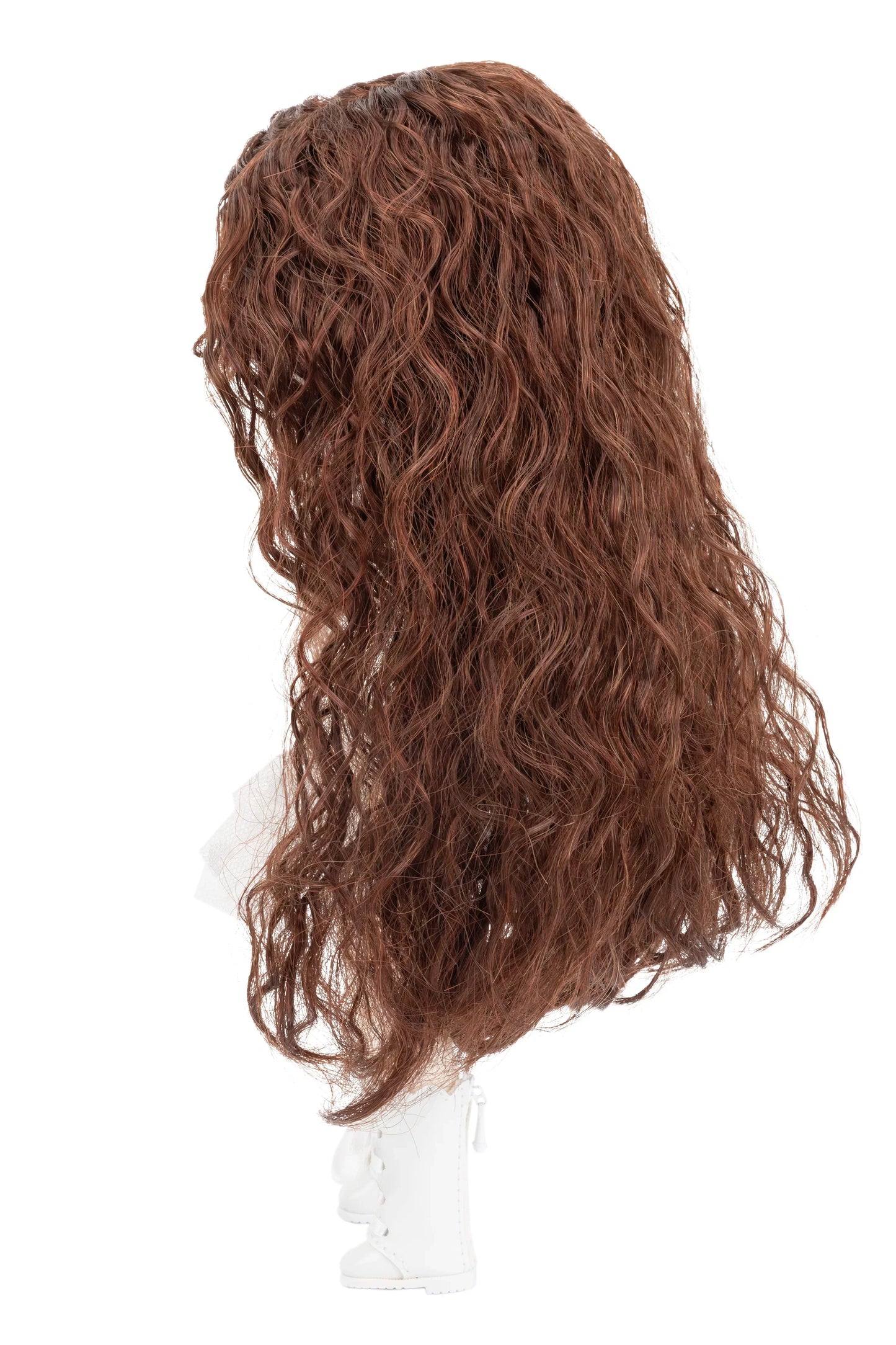 Brown wig on a mannequin head against a white background