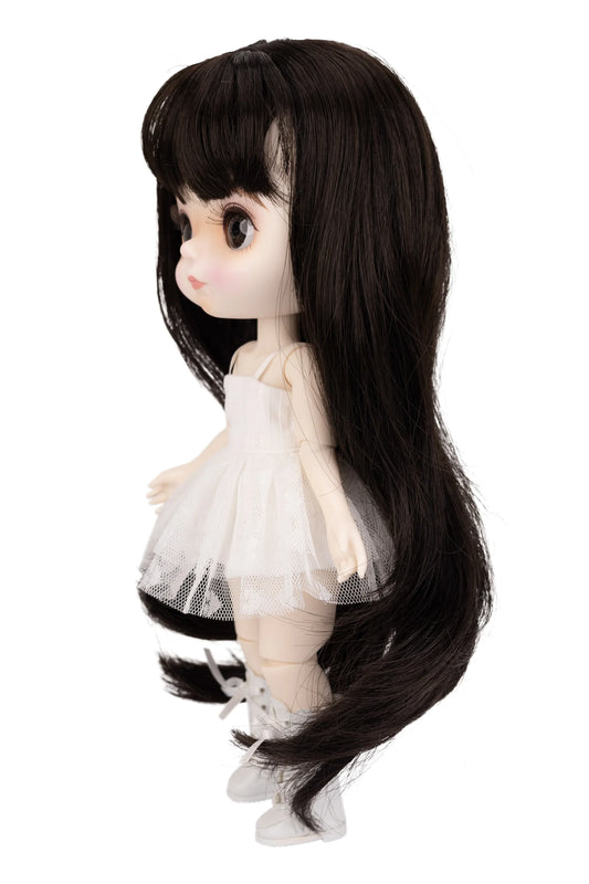 Doll with long dark brown hair and a white outfit on a white background