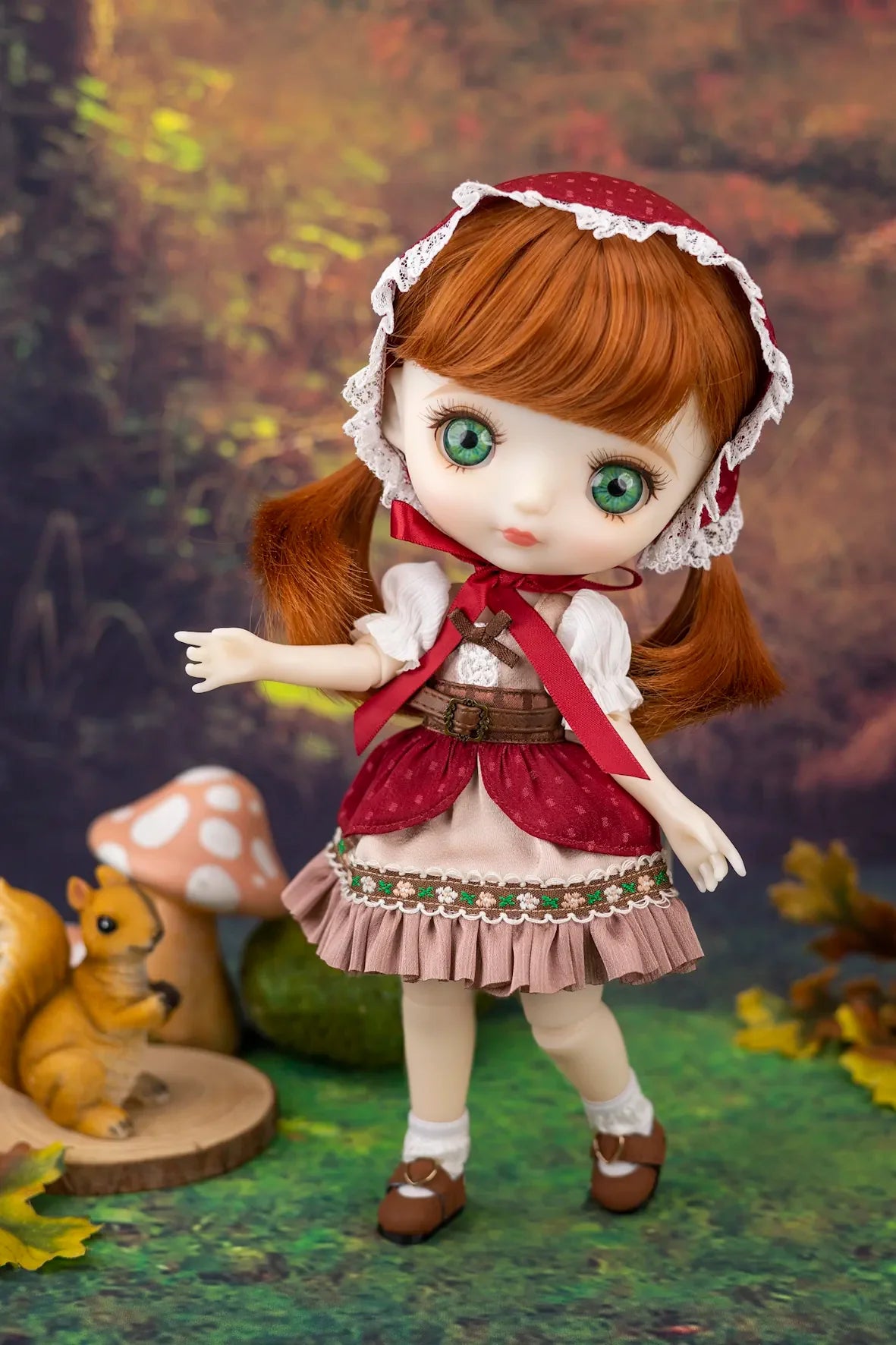 Doll with ginger hair and outfit standing in a forest setting