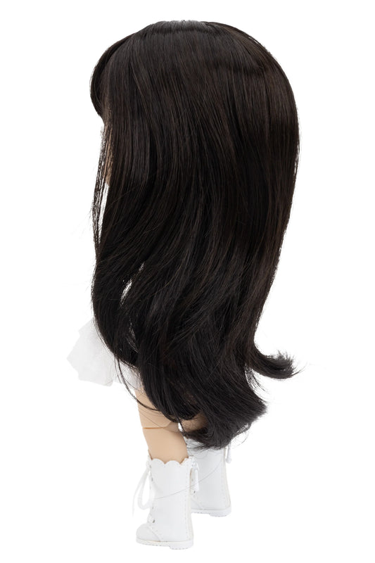 Dark brown wig on a mannequin head with white boots against a white background
