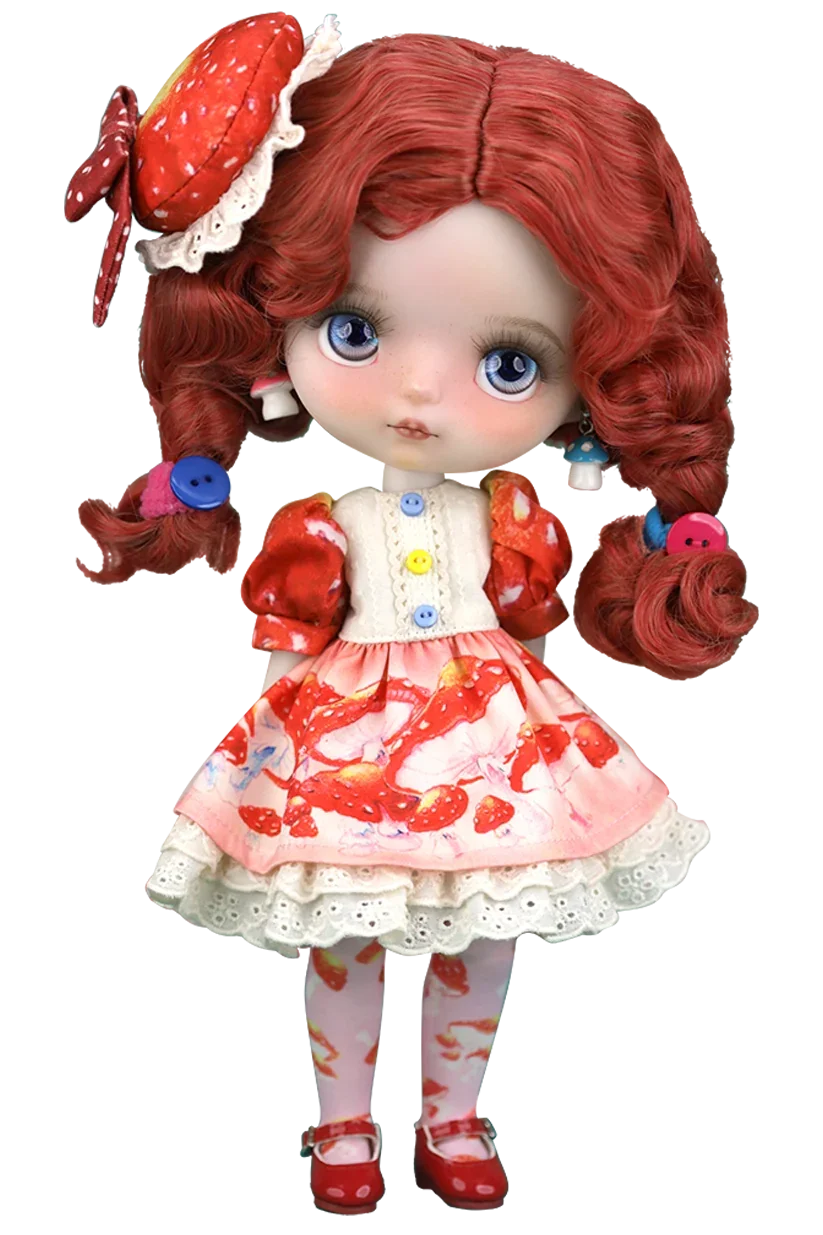 Mori Lolli Doll with red hair styled in pigtails, wearing a mushroom-themed outfit on a white background