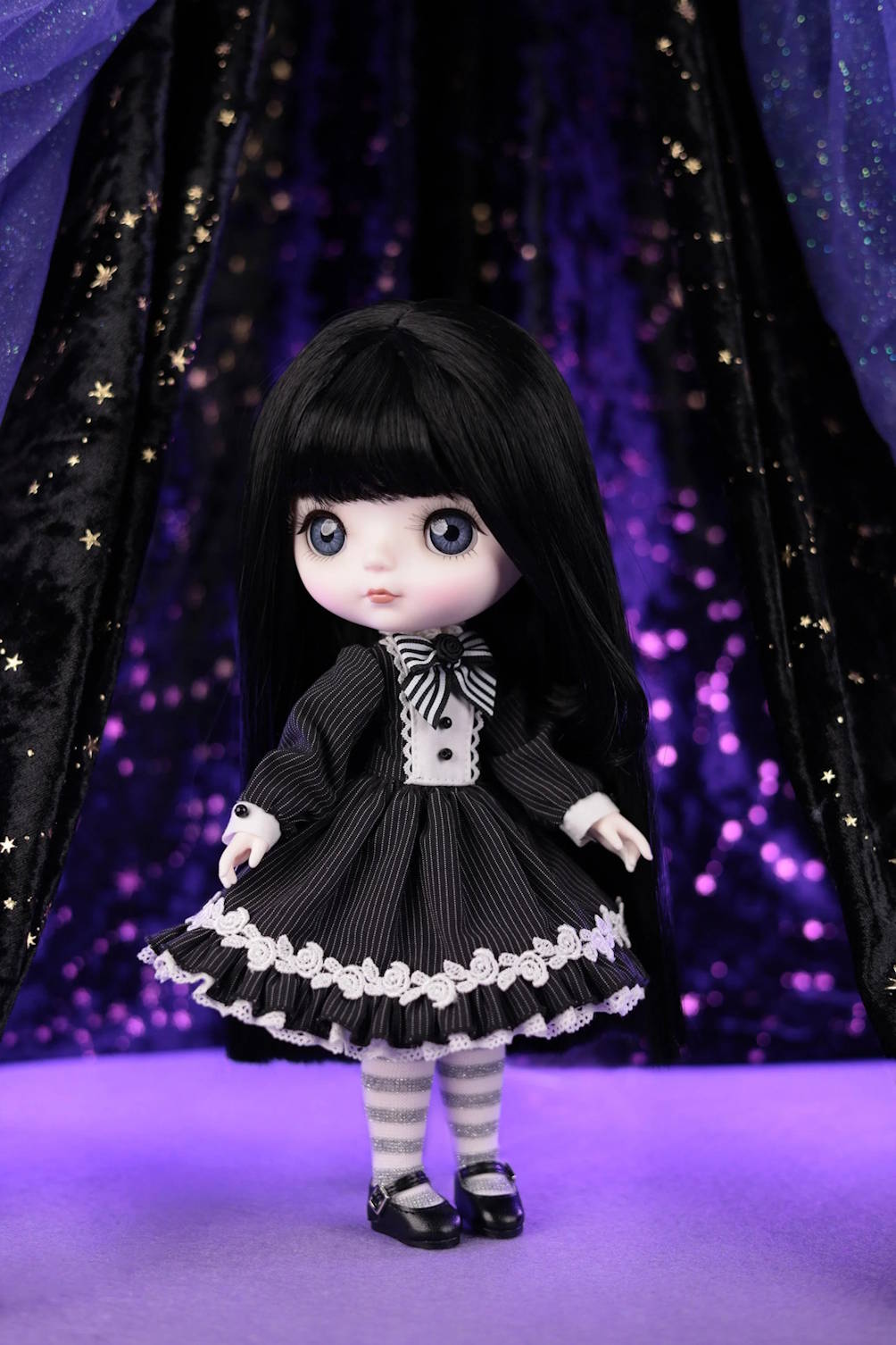 Mori Lolli Night Bloom collectible doll in a black gothic lolita dress and starry purple backdrop