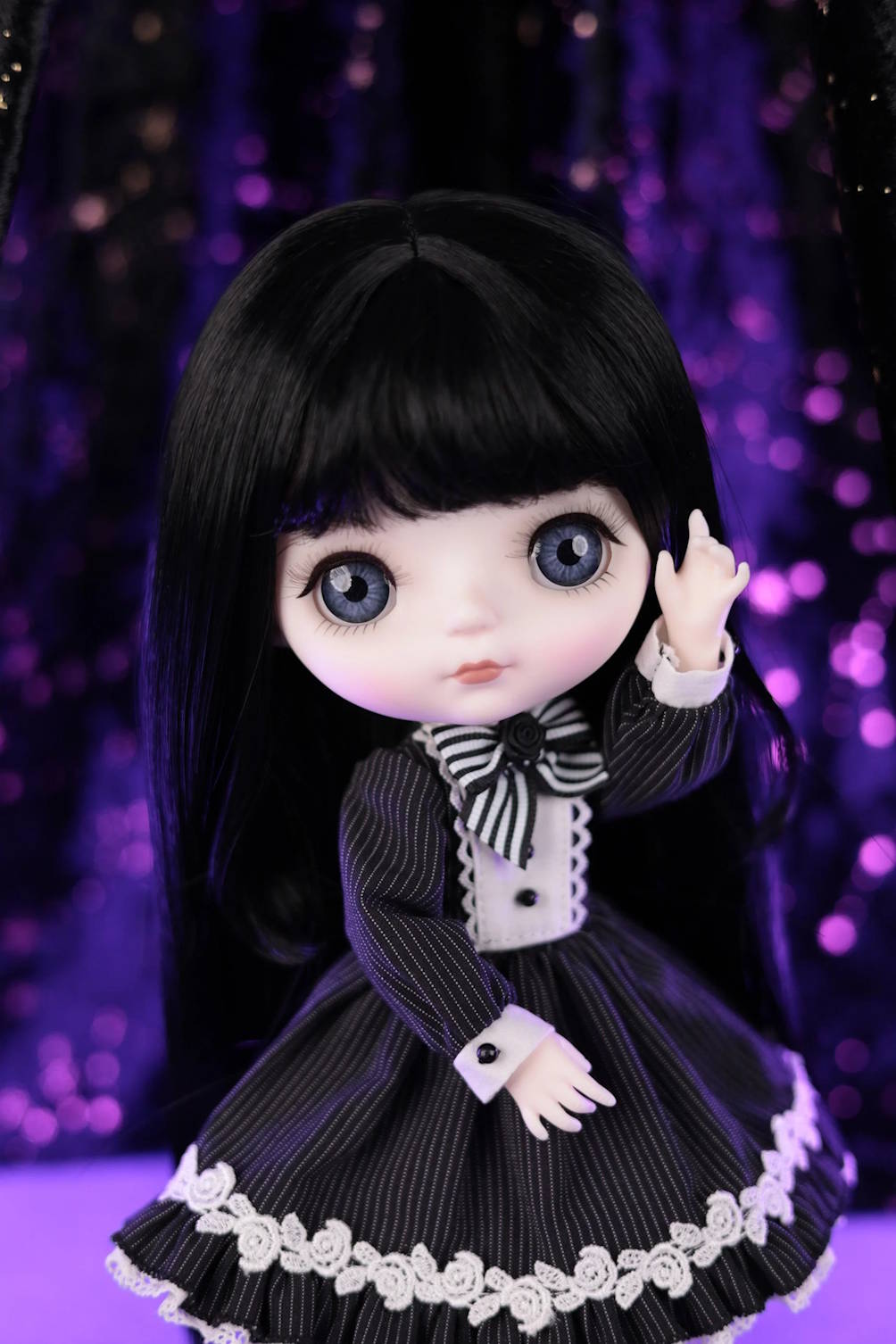 Mori Lolli Night Bloom collectible doll with black hair and a striped gothic lolita dress
