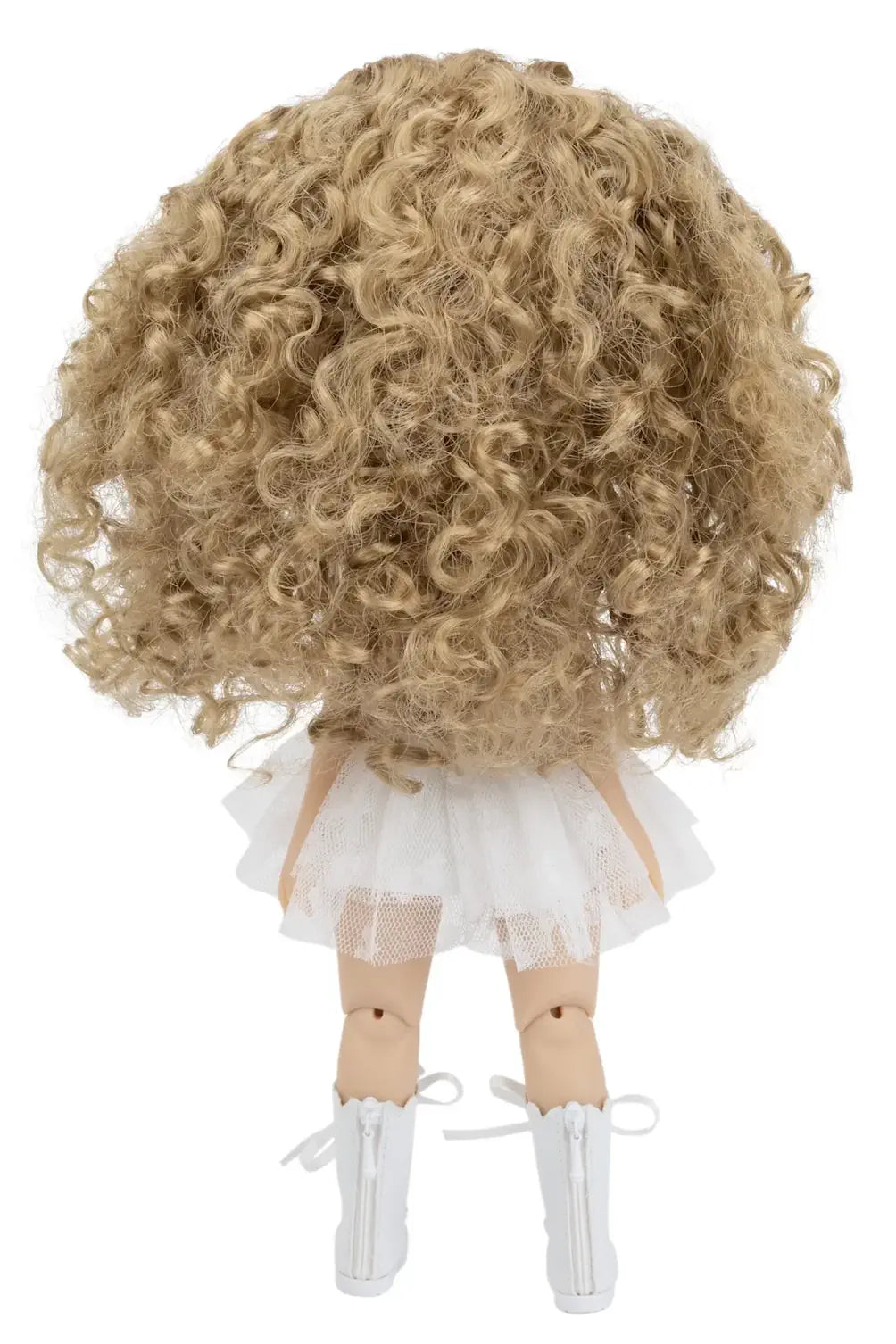 Doll with blonde curly hair wearing a white dress on a white background