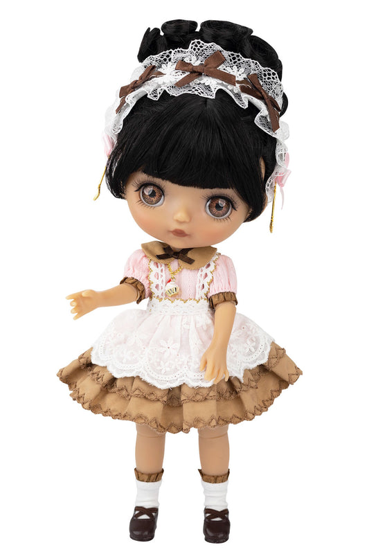 Doll with black hair, lace headband, pink dress, and brown skirt on a white background