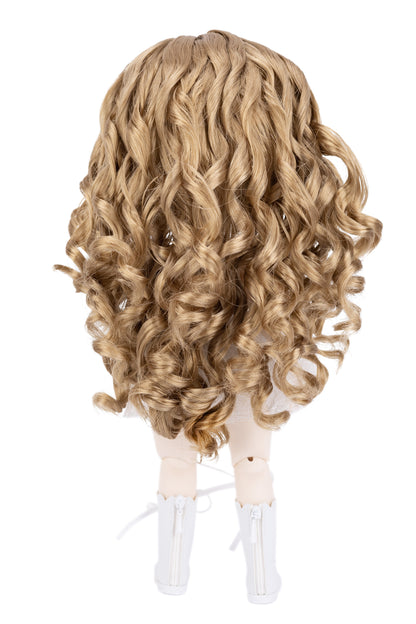 Blonde wavy wig on a doll head with white boots against a white background