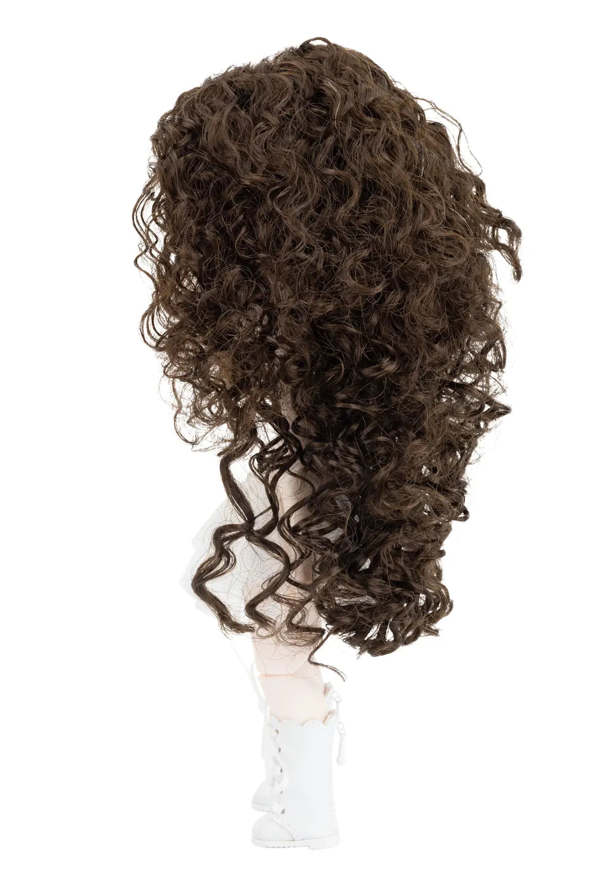 A long, voluminous dark brown curly wig displayed on a white mannequin head against a plain white background.