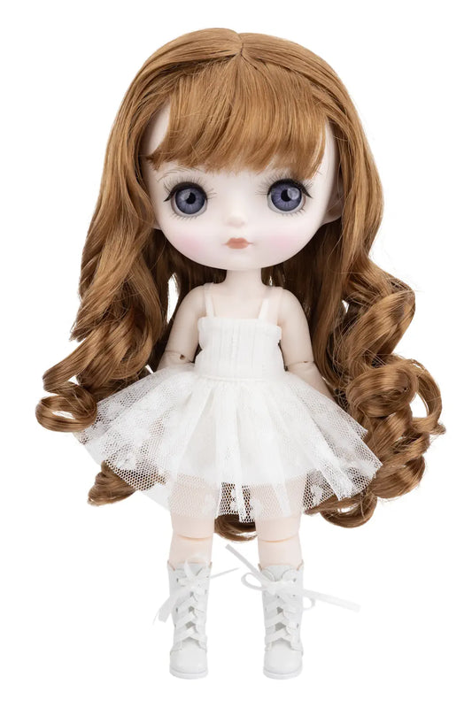 Doll with long brown hair, blue eyes, and a white dress on a white background