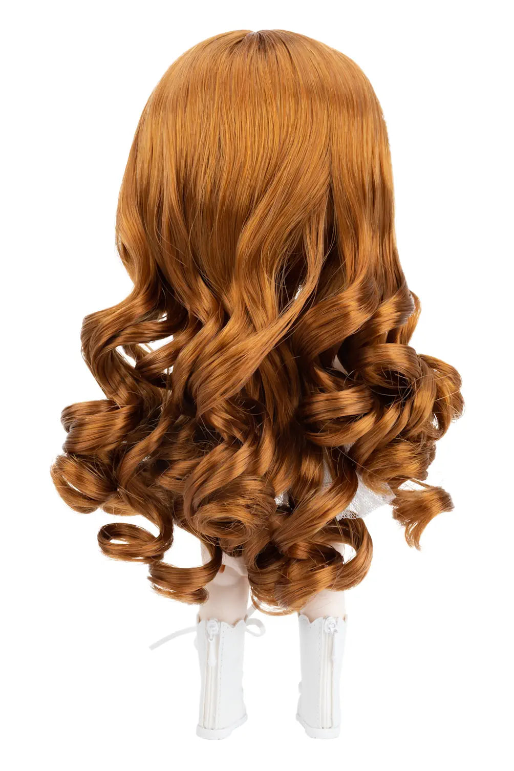 Ginger wig with curls on a Mori Lolli doll head against a white background