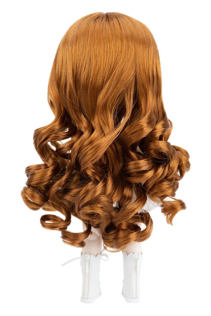 Ginger wig with curls on a Mori Lolli doll head against a white background