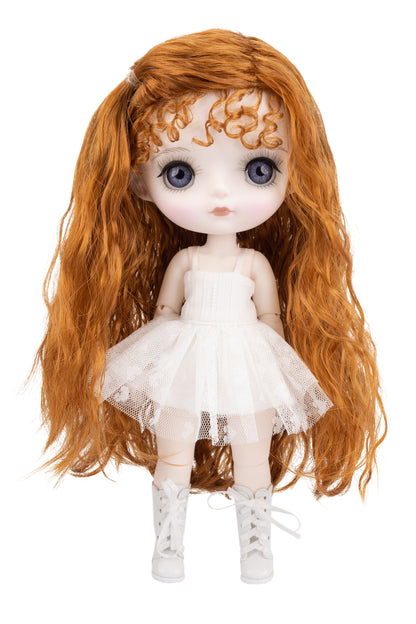 Doll with long brown hair and a white dress on a white background