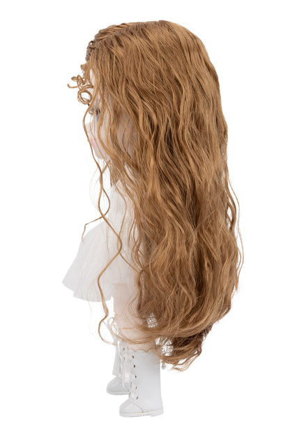 Doll head with long wavy brown hair on a white background