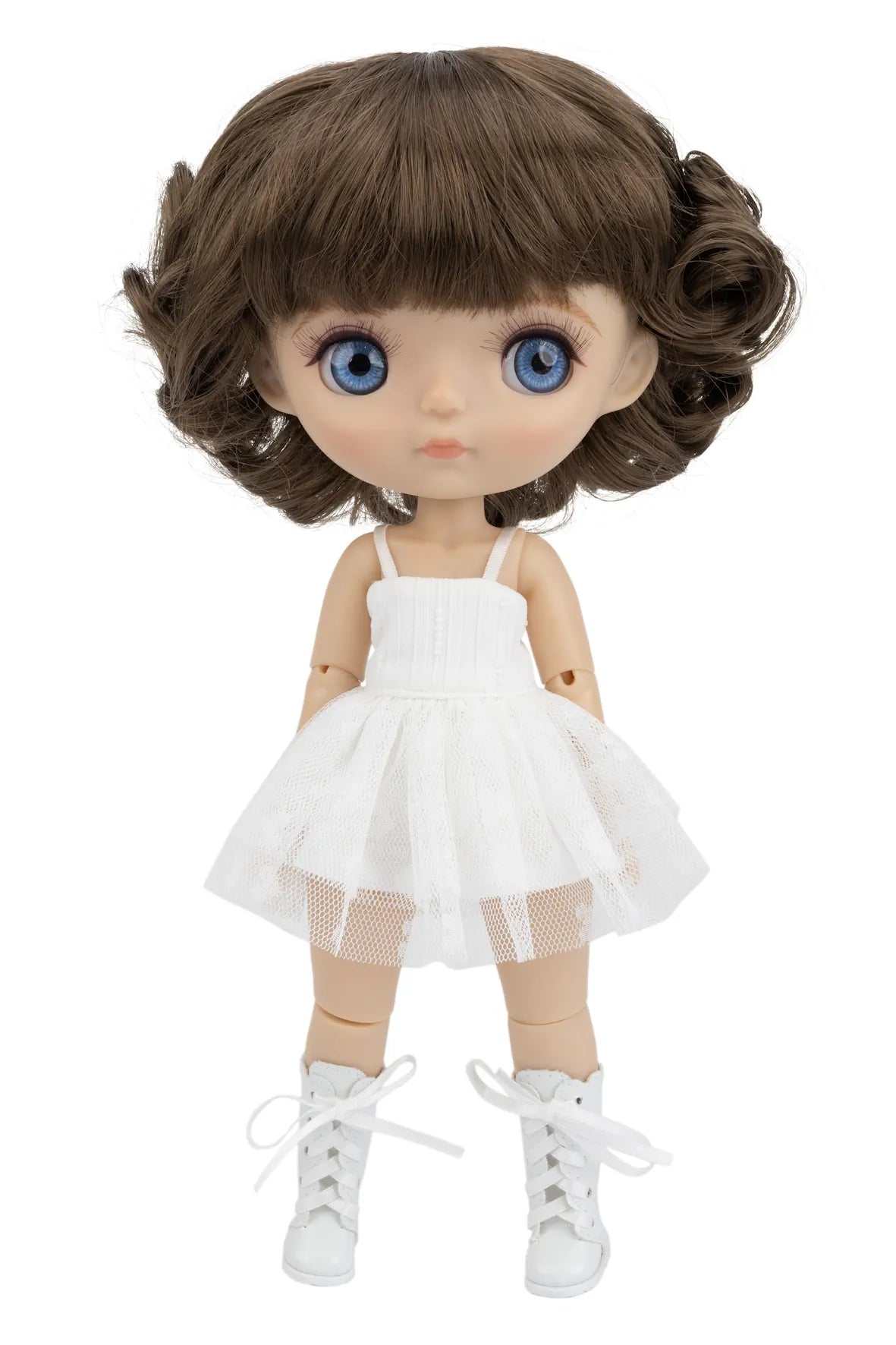 Doll with brown hair, blue eyes, and a white dress on a white background