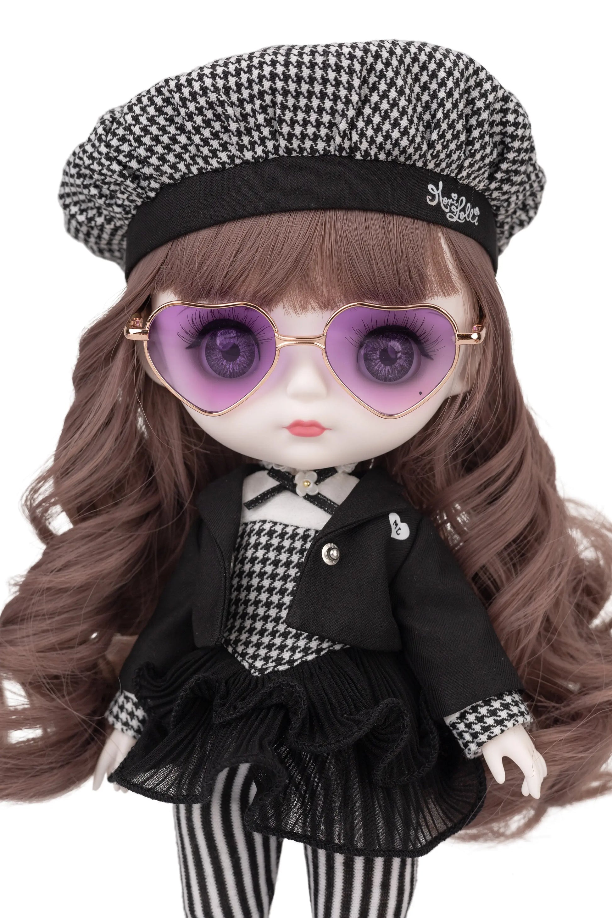 Doll wearing a black and white checkered outfit with a hat and purple sunglasses on a white background