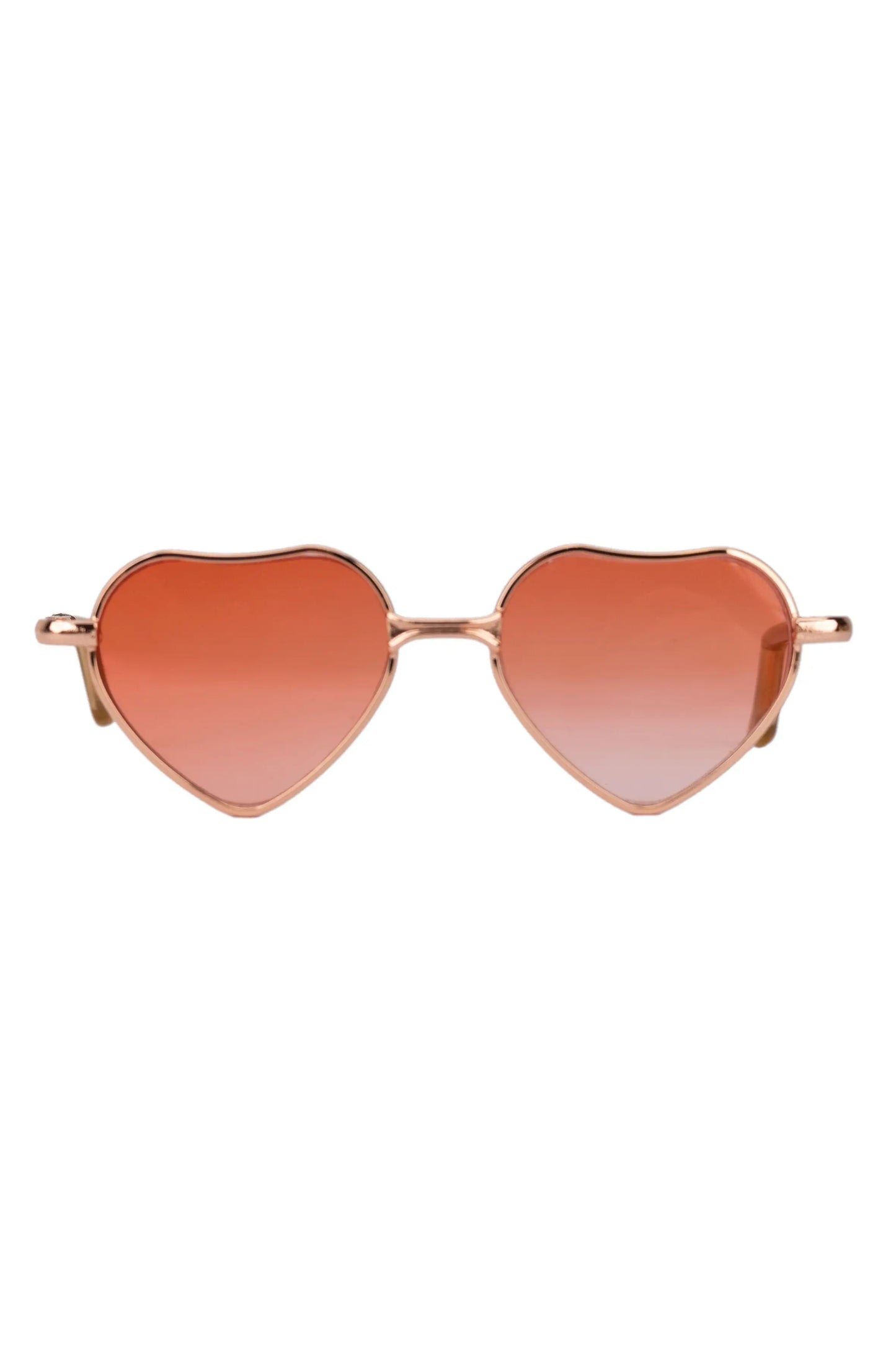 Heart-shaped sunglasses with rose gold frame and red lenses on a white background