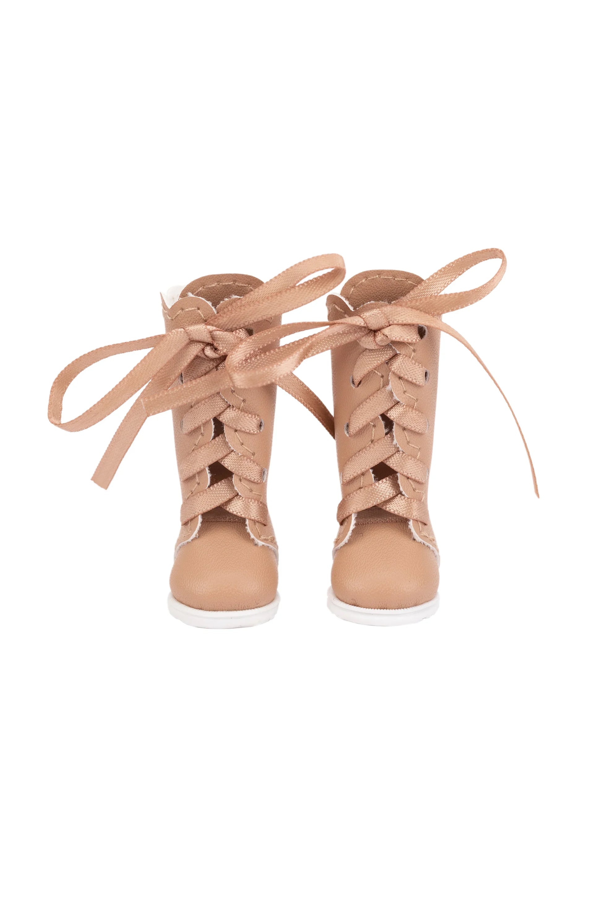 Pair of khaki lace-up boots on a white background