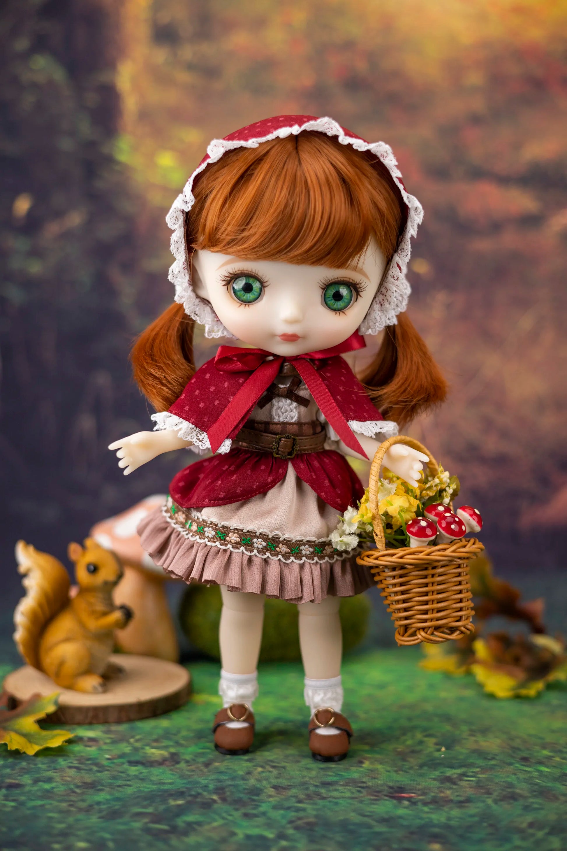 Doll with ginger hair and outfit, holding a basket of mushrooms, with a forest background.