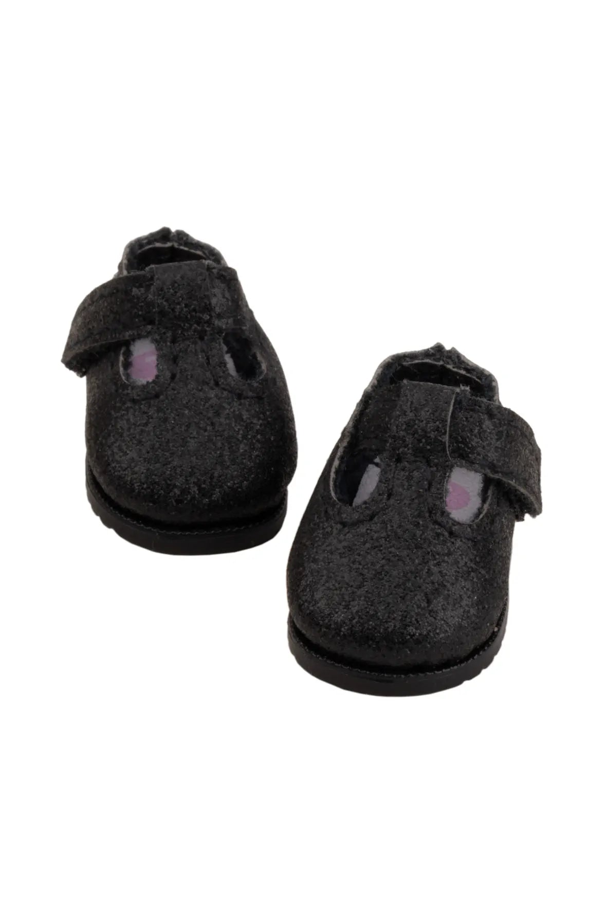 Pair of black doll shoes with velcro straps on a white background