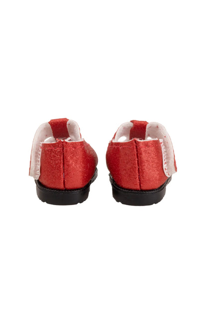 Red doll shoes back view on a white background