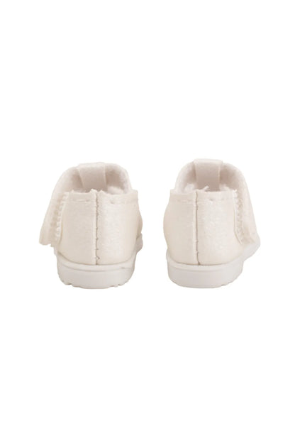 Pair of white doll sneakers with textured sole on a white background