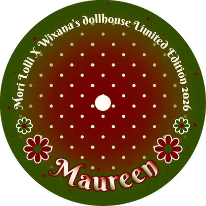 A circular graphic design featuring a dark green outer ring, a red-to-brown gradient center with white polka dots, decorative flowers, and the text 'Mori Loli x Wixana's dollhouse Limited Edition 2026' around the top edge and 'Maureen' at the bottom.