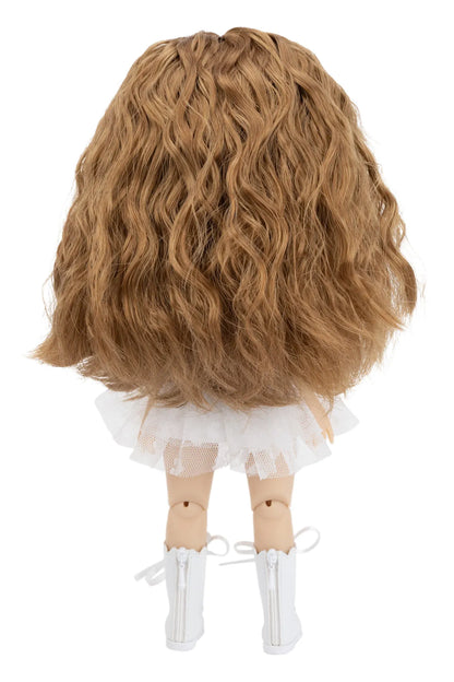 Doll with long wavy blonde hair and white outfit on a white background