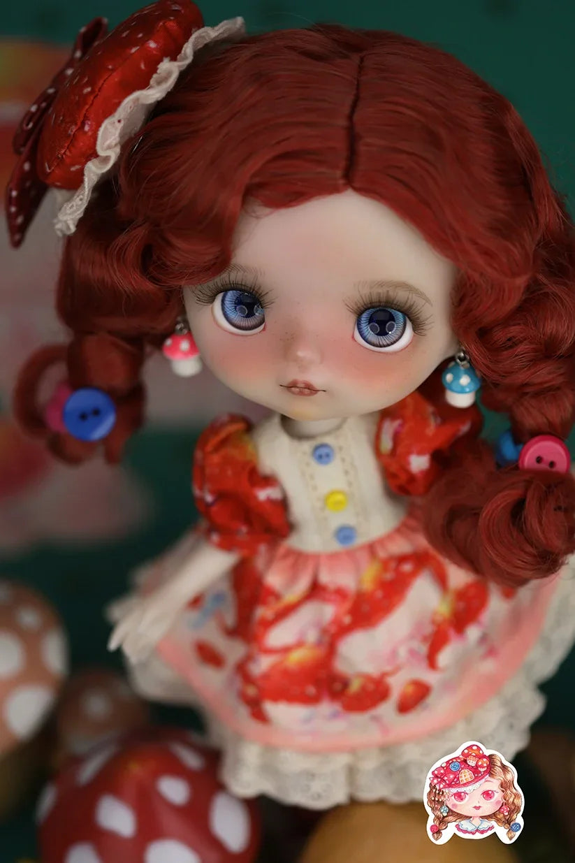 Mori Lolli Mushroom Fantasia Doll with red hair and a colorful outfit, surrounded by mushroom decorations.