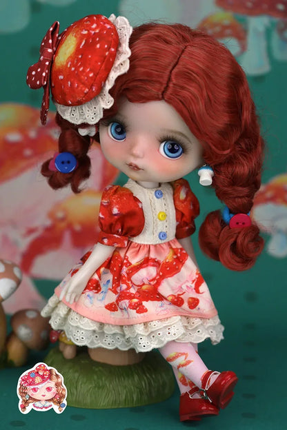 Mori Lolli Mushroom Fantasia Doll with red hair and a mushroom-themed outfit on a colorful background