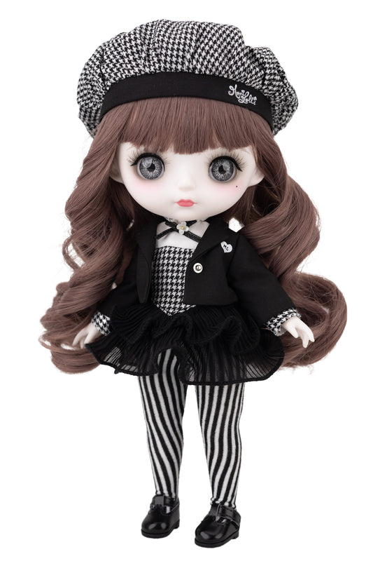 Doll with checkered hat, black jacket, and striped pants on a white background