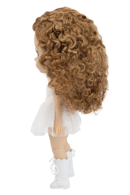 Doll with curly brown hair, white outfit, and white boots on a white background